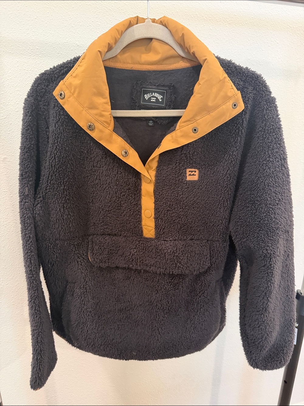 Billabong women's black sherpa zip-up with mustard trim